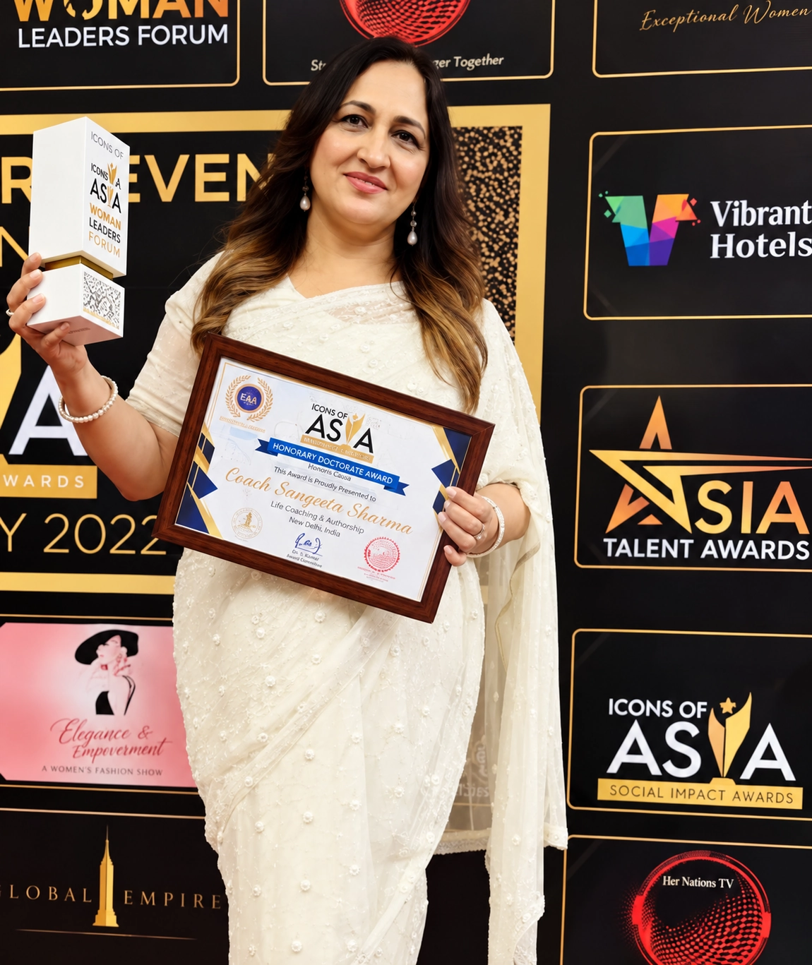 coach sangeeta celebrating award acheivement